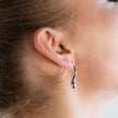 Style CORNING Argent (Or Blanc) : Boucles d'oreilles en forme de têtard – Élégance unique avec une touche ludique.