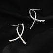 CREEDA Or Blanc (Couleur Argent) : Boucles d'oreilles créoles amovibles de forme avant-gardiste avec pierres précieuses en zircone.