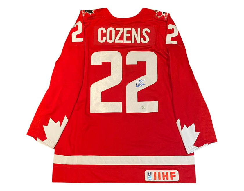 Dylan Cozens Autographed Team Canada Heritage Red Nike Jersey
