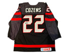 Dylan Cozens Autographed Team Canada Alternate Black Nike Jersey Ins. 