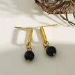 Boucles d'oreilles pendantantes en oxyde de fer noir de DAKATA