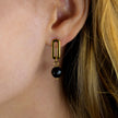 Boucles d'oreilles pendantantes en oxyde de fer noir de DAKATA