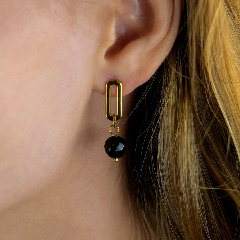 Boucles d'oreilles pendantantes en oxyde de fer noir de DAKATA