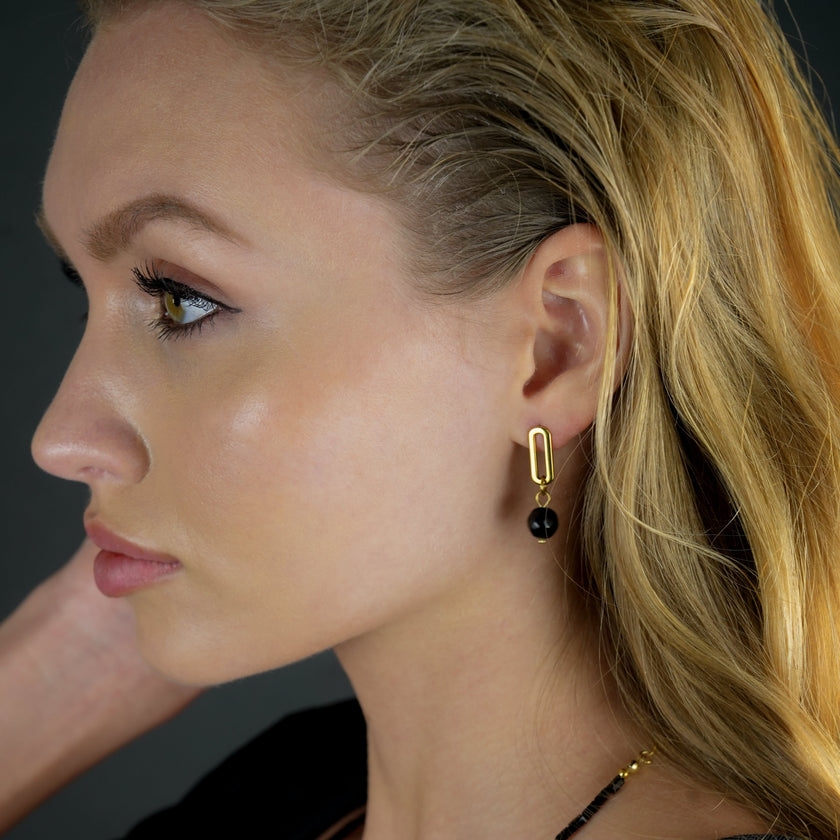 Boucles d'oreilles pendantantes en oxyde de fer noir de DAKATA