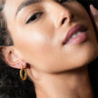 Boucles d'oreilles en forme de spirale texturée en or de DAVANIA
