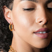 Boucles d'oreilles en forme de spirale texturée en or de DAVANIA