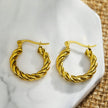 Boucles d'oreilles en forme de spirale texturée en or de DAVANIA
