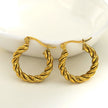 Boucles d'oreilles en forme de spirale texturée en or de DAVANIA