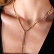 Collier DIANA avec chaîne perlée et détail lariat en zircone pavé.
