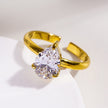 DIMONDA : Bague en or classique avec une pierre de zircone en forme de goutte d'eau comme pièce centrale.