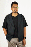 LA VESTE SANS MANCHES