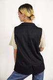 LA VESTE SANS MANCHES