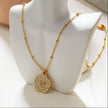 MELRINA Gold - Vintage Bloom: Beaded Chain Necklace with Pave Zirconia Flower Charm