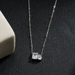 MAFFINA Argent (Or Blanc) : Collier délicat à maillons avec pendentif à double zircone.