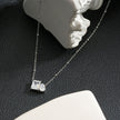 MAFFINA Argent (Or Blanc) : Collier délicat à maillons avec pendentif à double zircone.