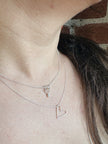 Collier avec breloque coeur et petite perle blanche