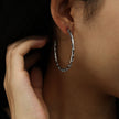 ELNA Silver Hoop Earrings with a Decorative Twist