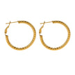 Style ETSUKO : Boucles d'oreilles en forme de cercle avec motif de roseaux sculptés