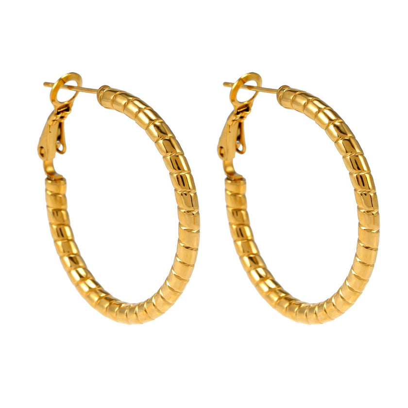 Style ETSUKO : Boucles d'oreilles en forme de cercle avec motif de roseaux sculptés