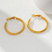 Style ETSUKO : Boucles d'oreilles en forme de cercle avec motif de roseaux sculptés