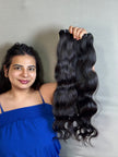Cheveux indiens vierges, boucles ondulées.