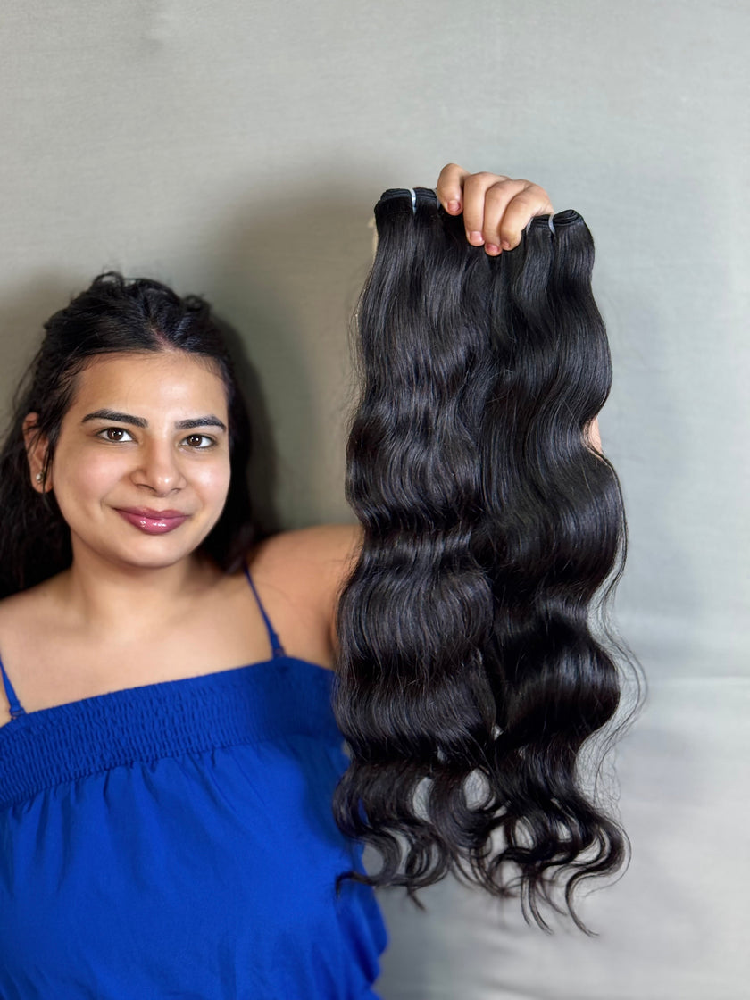 Cheveux indiens vierges, boucles ondulées.