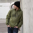 Sweat à capuche FA, couleur olive.