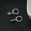 FATIMA White Gold (Silver Toned): Pavé Zirconia (CZ) Mini Hoop Earrings with Hamsa Hand Charm – A Perfect Blend of Style and Protection