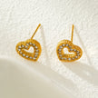 OREILLES FOREVER Gold : Boucles d'oreilles à puces serties de zircone (CZ) en forme de cœur éblouissante