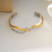 FREDRIKA : Bracelet géométrique abstrait et chic en métaux mixtes