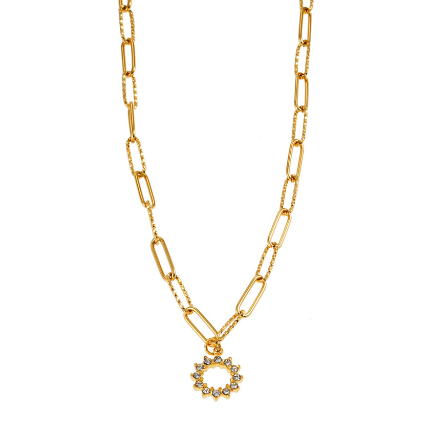 FRETTA: Radiant Star Shaped Pendant Zirconia Paper-Clip Chain Necklace in Gold.