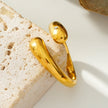 GARUVA: Modern Abstract Ring with Solitaire Zirconia Gemstone in Gold