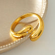 GARUVA: Modern Abstract Ring with Solitaire Zirconia Gemstone in Gold
