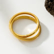GILBERT : Bague en or à double bande entrelacée, à porter en superposition.