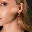 Boucles d'oreilles créoles ondulées GIZA 'Shape & Form'