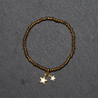 Elasticated Star Charm Bracelet In Gold Plate