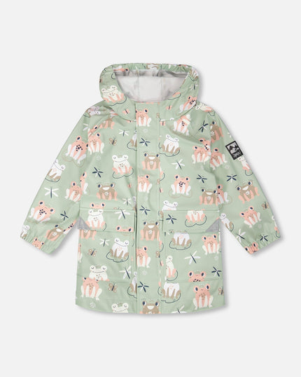 Green raincoat with color-changing frogs