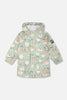 Green raincoat with color-changing frogs