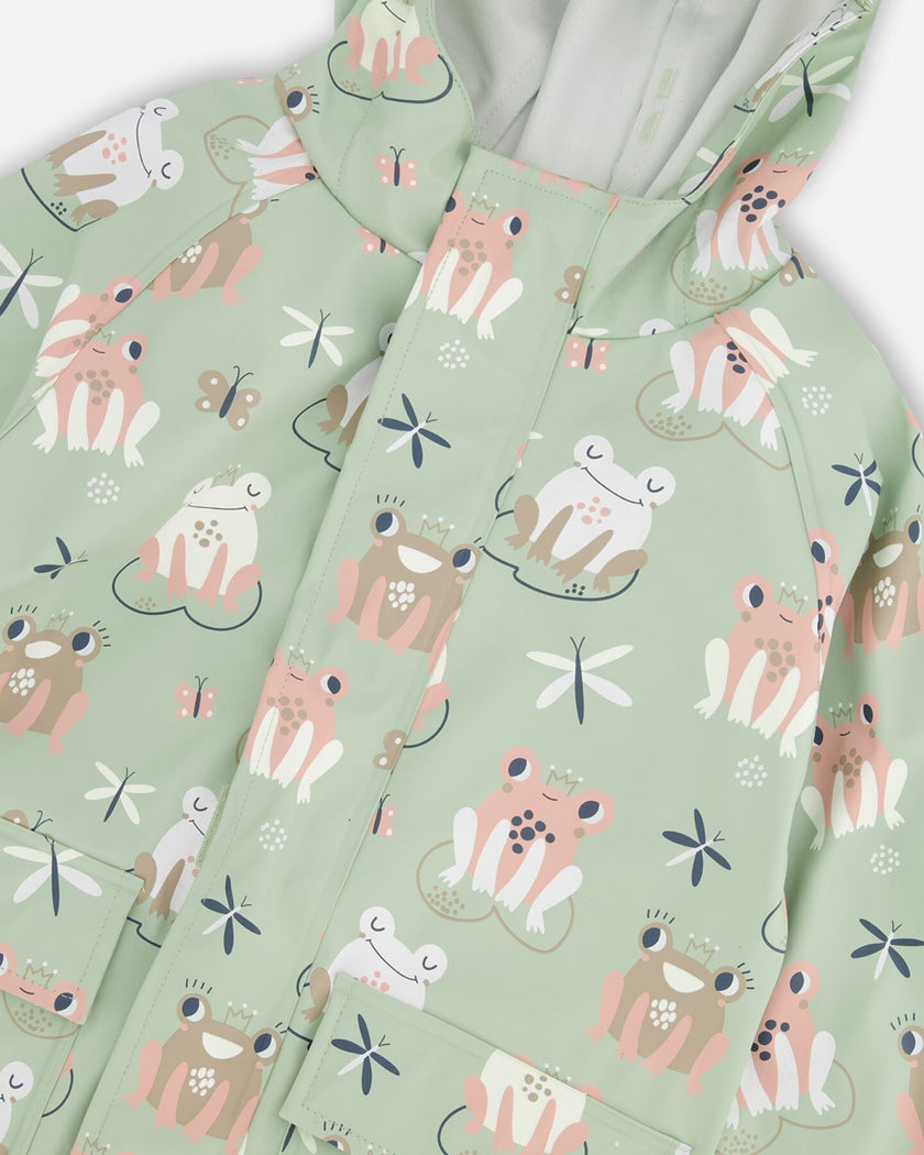 Green raincoat with color-changing frogs
