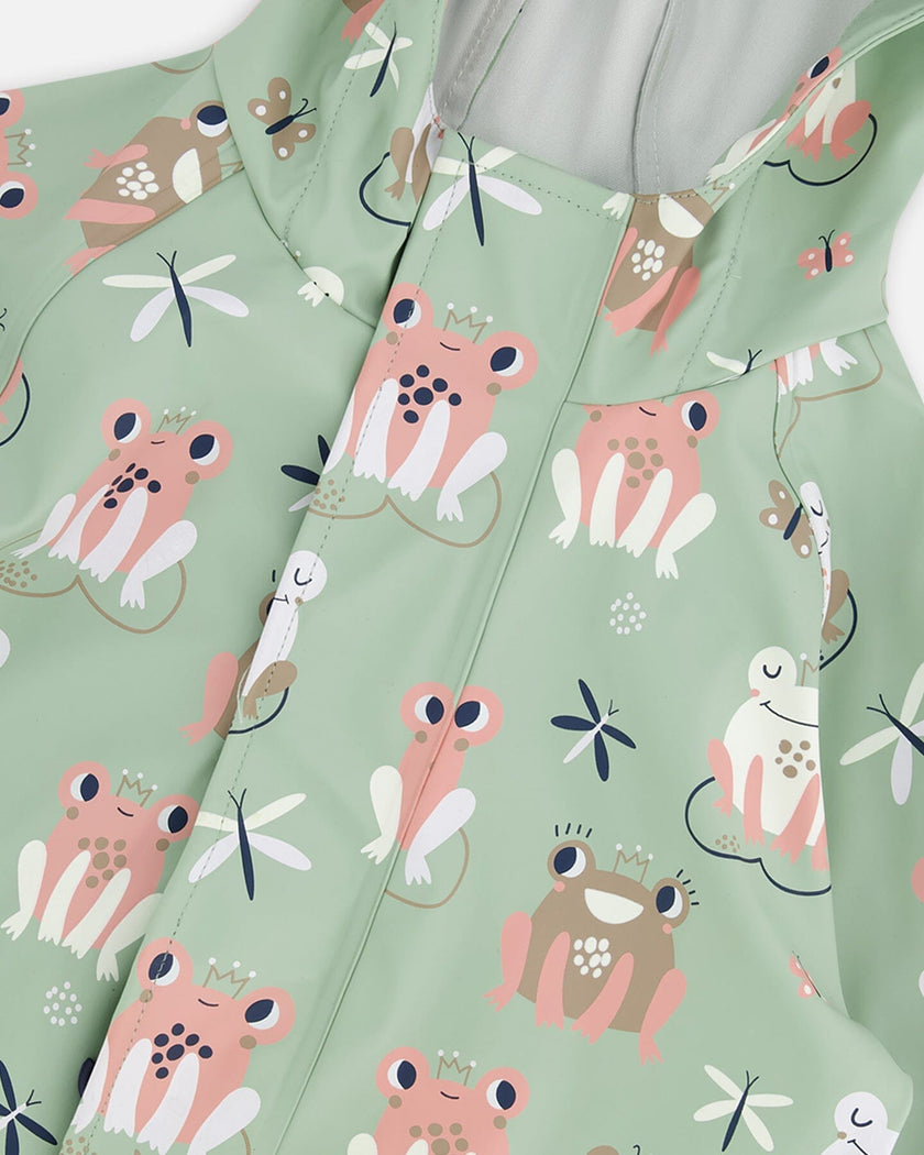 Green rain jumpsuit with color-changing frogs print