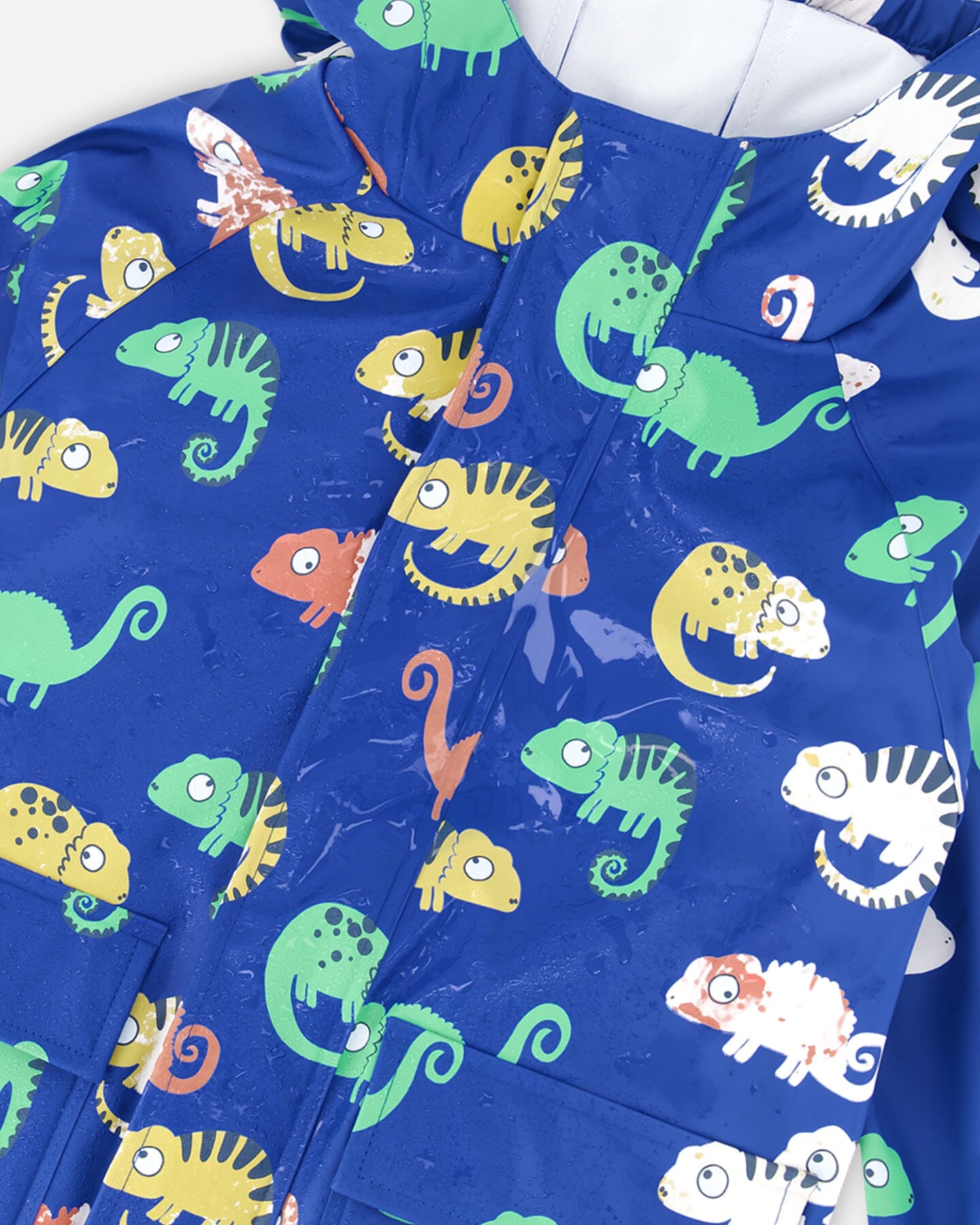 Blue rain jumpsuit with color-changing chameleon print