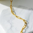HAKILA LG : Bracelet de cheville en chaîne d'anneaux d'acier doré essentiel
