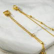 HILDA LG : Bracelet de cheville 2-en-1 avec perles carrées et perles rondes, noir et or.