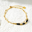 HILDA LG : Bracelet de cheville 2-en-1 avec perles carrées et perles rondes, noir et or.