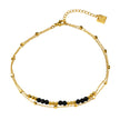 HILDA LG : Bracelet de cheville 2-en-1 avec perles carrées et perles rondes, noir et or.
