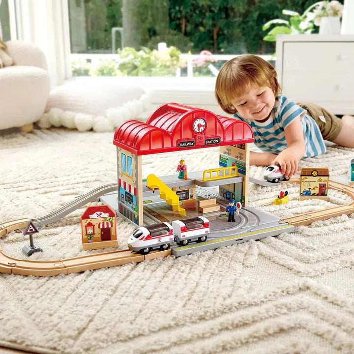 Hape - Jeu de gare de train portable