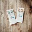 Crescent Bloom Stud Earrings – Floral Halo Design - Sparkle