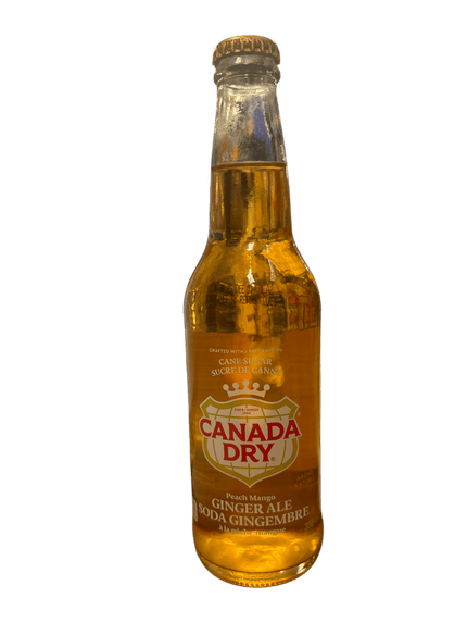 Canada Dry, Ginger Ale à la pêche et à la mangue, au sucre de canne, en bouteille de verre, 355 ml.