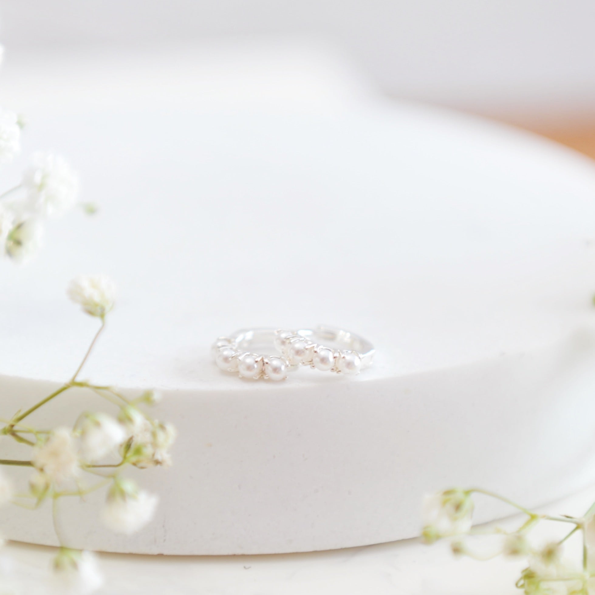 Pearl Huggie hoops