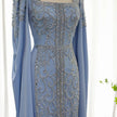 Kaftan style cape sleeves gown